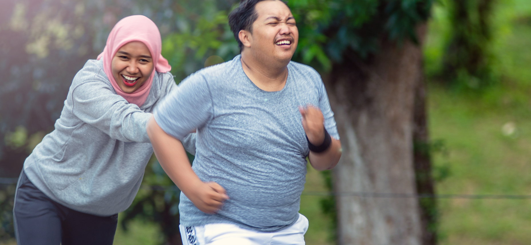 two people having fun while exercising