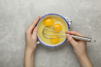 eggs being mixed in a bowl